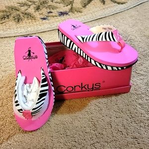 Corey's girls zebra flip flops